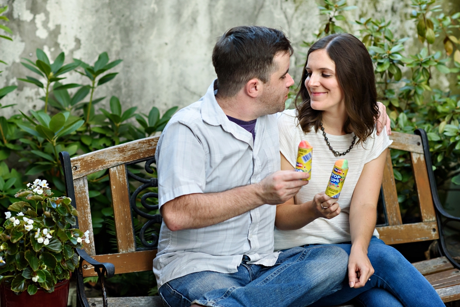 An adorable couple enjoy some ice cream on their engagement session in fishtown.